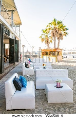 Seating Outside At Shimmy Beach Club At The V&a Waterfront Harbor