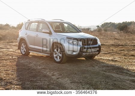 Dnipro, Ukraine - February 19, 2020: Toyota Rav4 2006 Gray Color Among The Sand Near The Forest, Ope