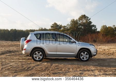 Dnipro, Ukraine - February 19, 2020: Toyota Rav4 2006 Gray Color Among The Sand Near The Forest, Ope