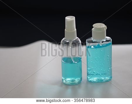 Alcoholic 70 Percent In Clear Plastic Bottle Spray, And Hand Sanitizer Gel On White Table Washing Cl