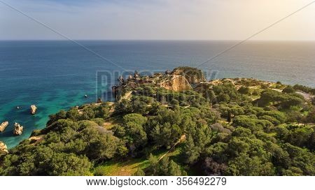 Aerial View Of The Beautiful Bay Of The Portuguese Coast Of The City Of Portimao. Beaches Vao, Tres 