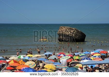 Matalascanas, Spain - July 10, 2011:matalascanias Beach With The Overturned Yeger Tower Visible In T