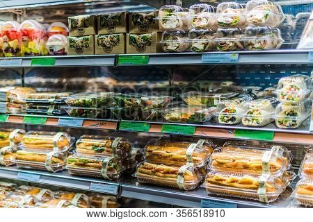 Pre-packaged Foods Displayed In A Commercial Refrigerator