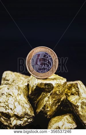 One Real Coin, With Gold Stones. Grand Prize Or Financial Savings Concept.