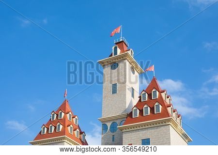 Towers Of A Decorative Castle, Exterior Of The New Dreamisland In Moscow Amusement Park. Brown Tiled