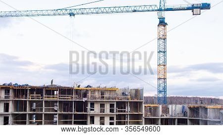 Moscow, Russia - January 22, 2020: Construction Of An Apartment Building, Workers Erect Ceilings. Co