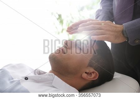 Psychotherapist And Patient In Office. Hypnotherapy Session