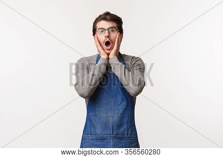 Portrait Of Shocked And Amazed Handsome Young Man Working Over Bar Counter, Barista Scream In Amazem