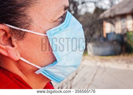 Woman Wearing Black Sunglasses Atex Gloves And Medical Face Mask