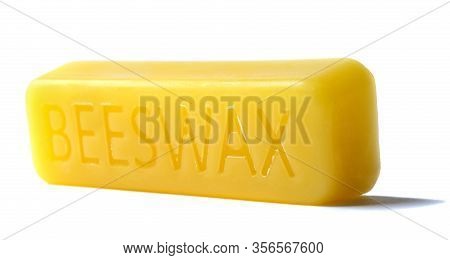 Beeswax On A White Background.beeswax Block. Natural Beeswax.