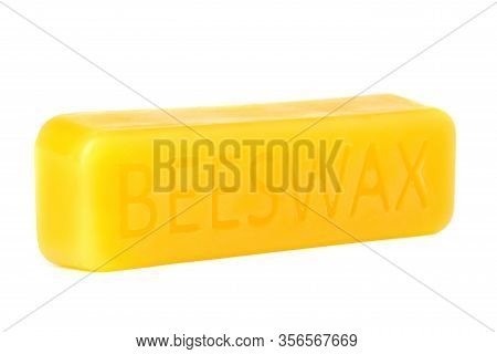 Beeswax On A White Background.beeswax Block. Natural Beeswax.