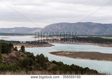 Buendia Reservoir With Turquoise Waters In Spring