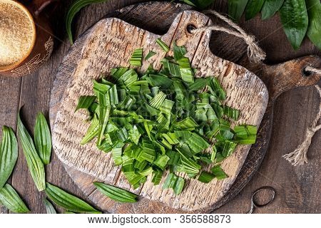 Cut-up Fresh Plantain Leaves - Preparation Of A Homemade Herbal Syrup Against Cough