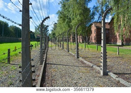 Auschwitz Birkenau Poland 09 17 17: Auschwitz Concentration Camp Fences Was A Network Of German Nazi
