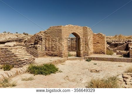 Ancient Wall And Entrance To The Building, The Ruins Of An Ancient City Sawran Or Sauran Near The Ci