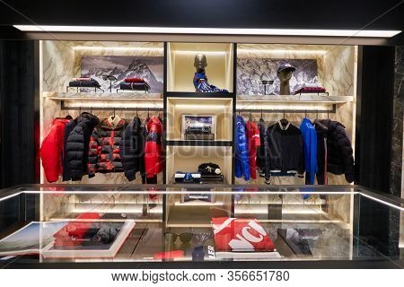 SINGAPORE - APRIL 21, 2019: clothes on display at Moncler store in Singapore Changi Airport. Moncler S.p.A is an apparel brand mostly known for its skiwear.