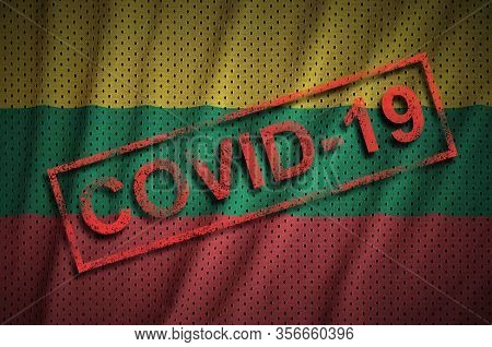 Lithuania Flag And Red Covid-19 Stamp. Coronavirus 2019-ncov Outbreak