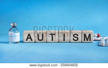 Autism - Text On Cubes. Drug In Ambula, Tablets In Blisters To Reduce Disease Symptoms