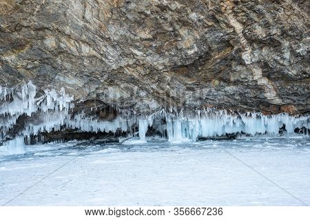 Ice On The Stone Wall. Close Up One Of The Rocks Of Cape Sagan-khushun Or Three Brothers, Olkhon Isl
