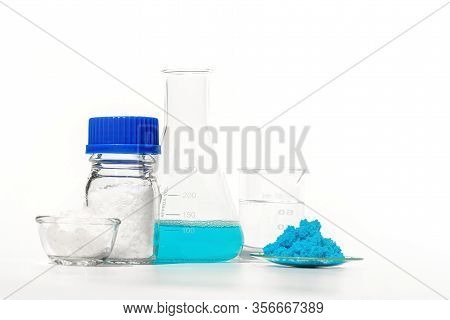 Inorganic Chemical On White Laboratory Table. Copper(ii) Sulfate, Microcrystalline Wax, Nickle Chlor