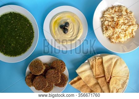 Famous Traditional Arabic, Middle East, Israel Cuisine. Tahini Sauce, Pita Bread, Rice With Vermicel