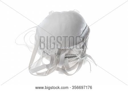 Stack Pile Of Face Masks For Respiratory Protection Agains Virus And Dust. Isolated On White.