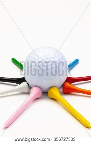 Golf Set - Ball With Tees. Golf Tees In The Rainbow Colors.  Star Composed Of Golf Ball And Wooden T