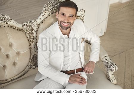 The Groom Smiling And Looking At The Camera. Elegant Young Handsome Man With A Beard In A White Clas