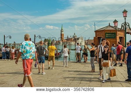 St. Mark Square, Venice, Italy - August 02, 2019: Traghetto Gondola Service Station Near Doge S Pala