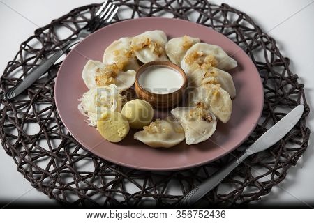 Dumplings With Stewed Cabbage, Homemade Traditional Ukrainian Dish Varenyky
