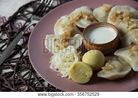 Dumplings With Stewed Cabbage, Homemade Traditional Ukrainian Dish Varenyky