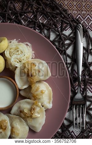 Dumplings With Stewed Cabbage, Homemade Traditional Ukrainian Dish Varenyky