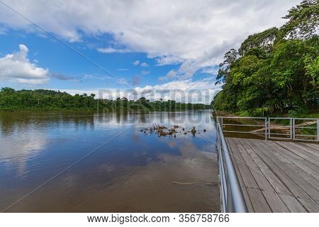 Suriname River Running Through The Brokopondo District In South America.
