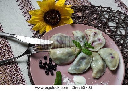 Dumplings With Bilberry, Homemade Traditional Ukrainian Dish Varenyky