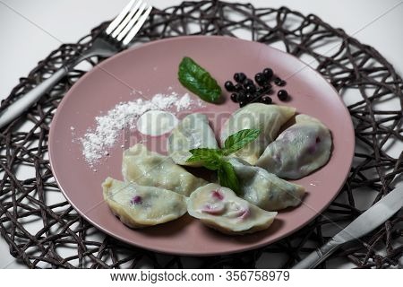 Dumplings With Bilberry, Homemade Traditional Ukrainian Dish Varenyky