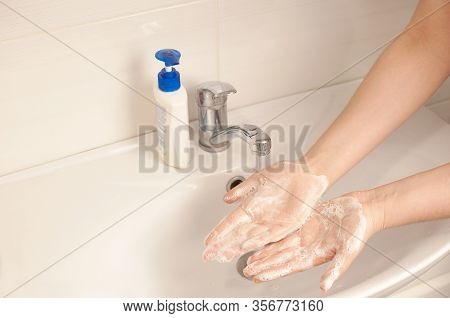 Step 5. Foam The Soap Well. To Prevent A Coronavirus Pandemic, Wash Your Hands Thoroughly With Warm 
