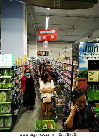Kuala Lumpur, Malaysia, March 17 2020: COVID-19 Malaysian shoppers panic buying during announcement of coronavirus lockdown quarantine orders from the government.