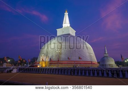 The Ancient Ruwanweli Maha Seya Dagoba On Evening Twilight. Anuradhapura, Sri Lanka
