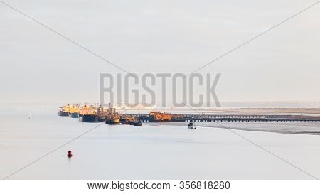 Fawley, England - October 29:  Oil Tankers Docked Beside Fawley Oil Refinery On October 29, 2016.  T