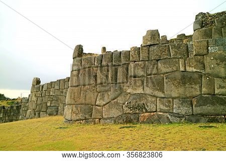 Ruins Of Ancient Inca Huge Stone Wall Of Sacsayhuaman Fortress, Archaeological Site In Cuzco, Peru, 