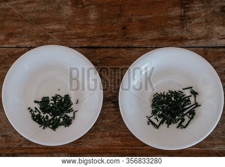 Spiruline Marine Flakes On Plate. Dietary Supplement, Super Food.