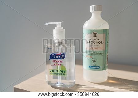 CANADA- MARCH 15. Corona virus COVID-19 Purell hand sanitizer gel rub and 70% rubbing alcohol antiseptic cleaner sanitizing bottle for sale on store shelf in Canada March 15 2020.