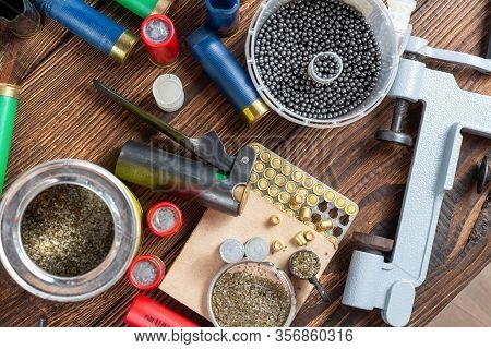 Reloading Process Shotgun Shells With Special Reload Equipment. Powder, Bullets, Fraction, Shells, B