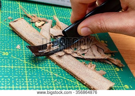 Thinning Brown Leather Stripe With Skiver Tool. Leather Craft Hobby