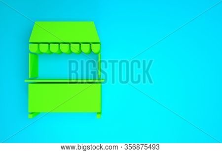 Green Street Stall With Awning And Wooden Rack Icon Isolated On Blue Background. Kiosk With Wooden R