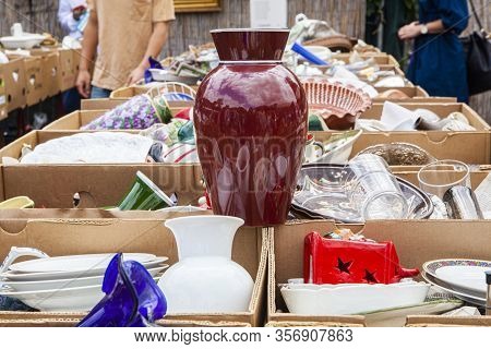 Berlin, Germany - 7 July 2019: Glassware And Pottery In Boxes At Fleamarket At Mauerpark