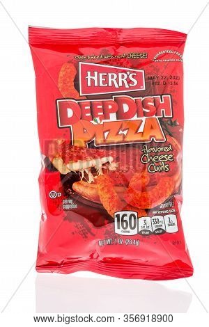 Winneconne,  Wi - 17 March 2020:  A Package Of Herrs Deep Dish Pizza Cheese Curls On An Isolated Bac