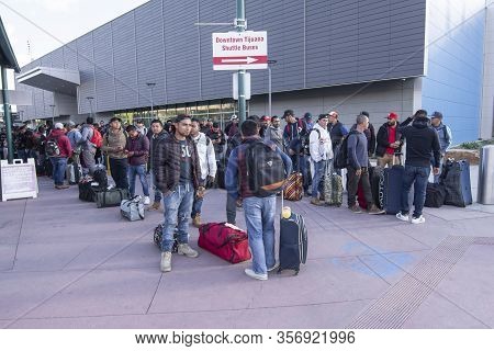 San Ysidro, California, Usa - March 20, 2020: Migrant Workers From Mexico Wait For Buses To Transpor