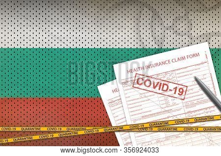 Bulgaria Flag And Health Insurance Claim Form With Covid-19 Stamp. Coronavirus Or 2019-ncov Virus Co