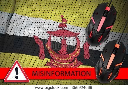 Brunei Darussalam Flag And Two Computer Mouses. Misinformation During Coronavirus Or 2019-ncov Virus